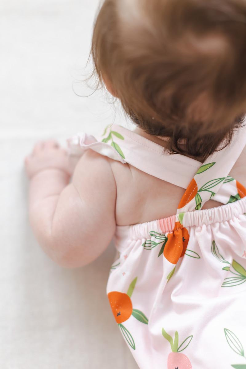 Tangerine Ruffle Cross Back Romper